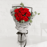 Elegant 10 red roses bouquet wrapped in translucent cellophane