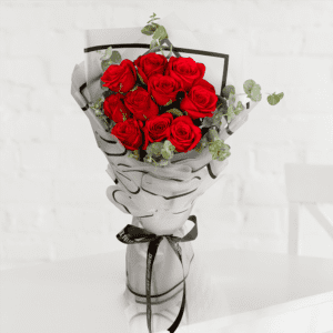 Elegant 10 red roses bouquet wrapped in translucent cellophane