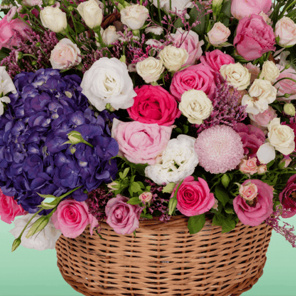 Pure Magic (1) Colorful floral arrangement in basket